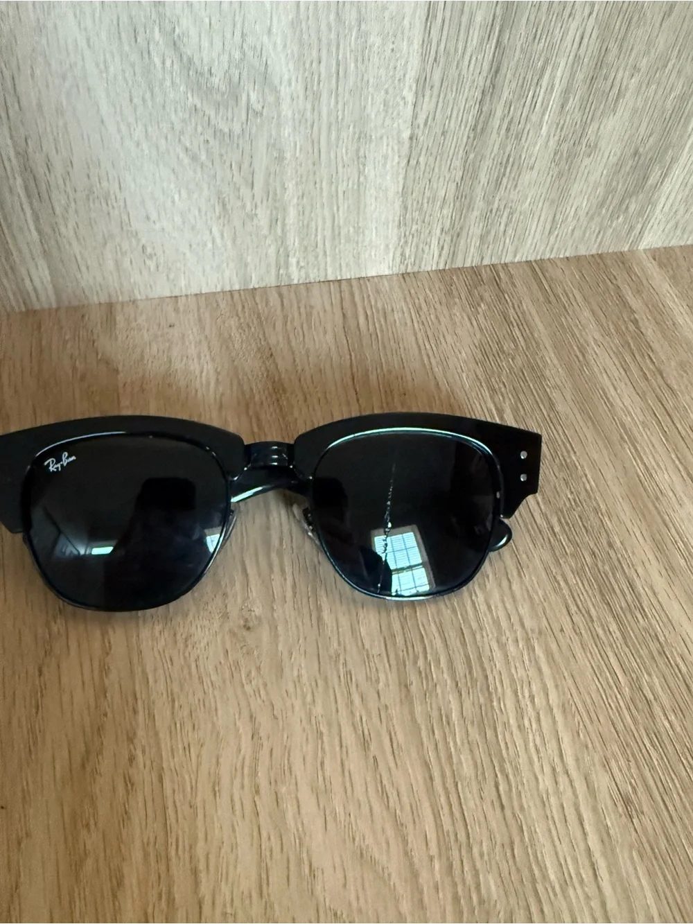 Ray-Ban Black Frame Sunglasses with Dark Lenses